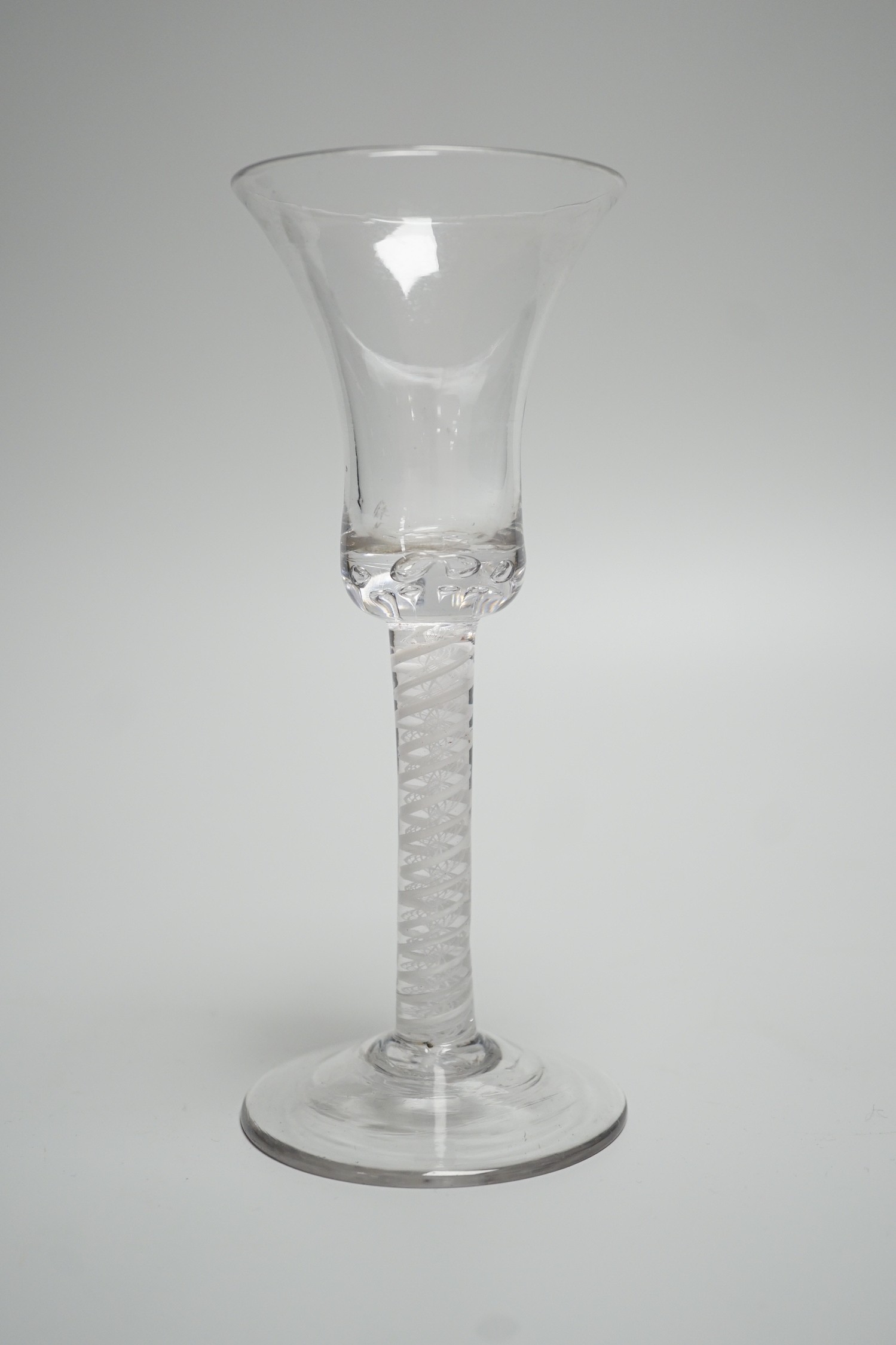 An 18th century Double series opaque twist stem wine glass. 18.5cm tall